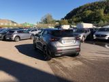 a lot of cars that are parked in a parking lot