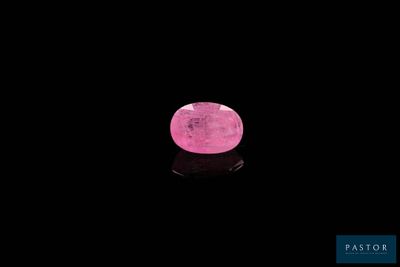 the moon is lit up in the dark with a pink light