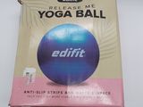a box of yoga ball sitting on top of a table
