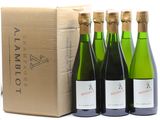 three bottles of wine are sitting next to a box of wine