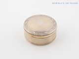 an image of a silver box on a white surface with a white background