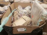 a cardboard box filled with a lot of items