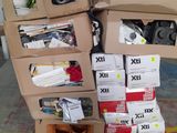 many boxes stacked on top of each other in a warehouse
