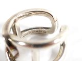 a close up of a ring on a white surface