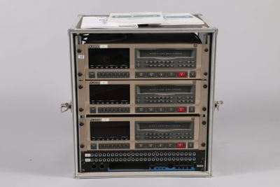 an image of a rack of electronics sitting on top of a white surface