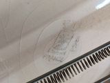 a close up of a comb with a drawing of a horse on it