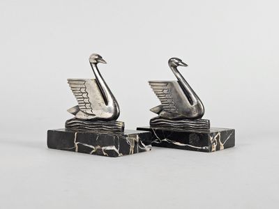 pair of art deco swan bookends on marble bases