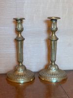 PAIRE DE BOUGEOIR en bronze doré, fûts cannelés et rudentés.