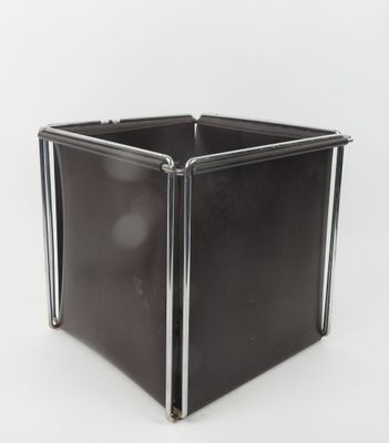 an image of a black metal planter on a white background