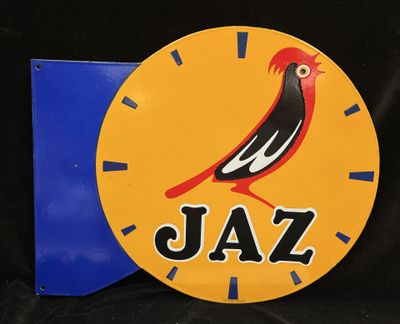 a clock with a bird on it and the word jazz written on it