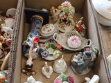 a box full of assorted items sitting on the floor
