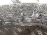 a purse with a zipper on the inside of it