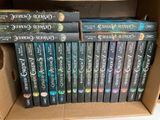 a lot of books in the box on the shelf