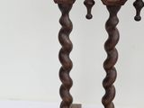 a wooden table with a clock on top of it