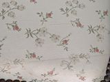 an image of a close up of a chair with flowers on it