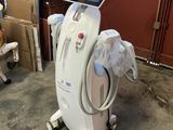 a machine that is sitting on a cart in a room