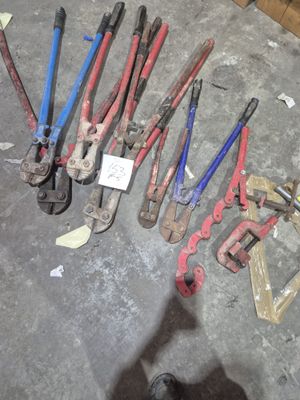 a lot of tools that are laying out on the floor