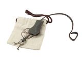 a small bag with a knife and a key in it