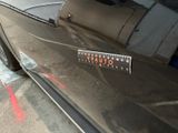 a sticker on the side of a car that says no parking