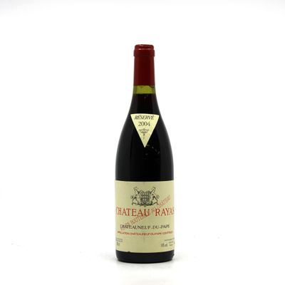 a bottle of wine that is sitting on a table