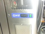 an image of a commercial ice maker in a kitchen