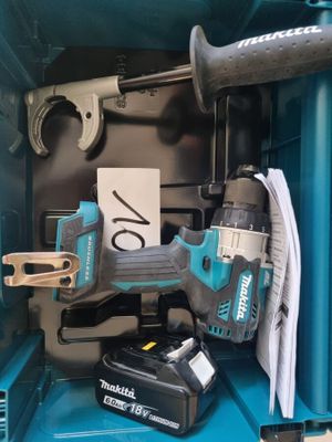 a blue box with tools in it and a hammer