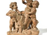 statue of a boy and a girl with a goat on a white background