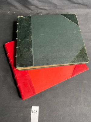 three books are stacked on top of each other on a table