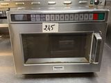 a microwave that is sitting on a counter in a kitchen