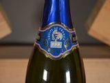 a bottle of wine that is sitting on a table