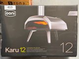 a box that has a pizza oven inside of it