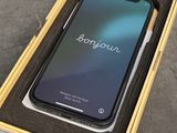 a box with a phone inside of it sitting on a table