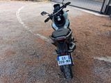 a motorcycle that is parked in a parking lot