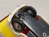 a close up of a toy car with wheels on it