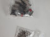 a bag of clips and a pair of scissors on a table