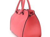 a pink handbag on a white background