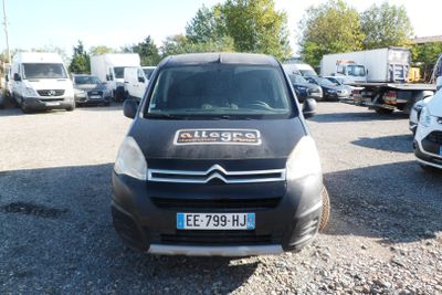 citroen van parked in a lot with other vehicles in the background