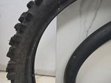 a tire and a tire on the floor next to each other