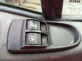 a close up of a car door handle with buttons on it