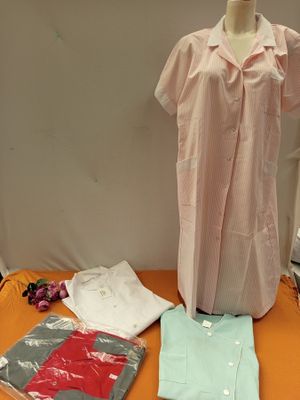 a mannequin on a table with clothing on it