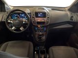 the interior of a car with a steering wheel and dashboard controls