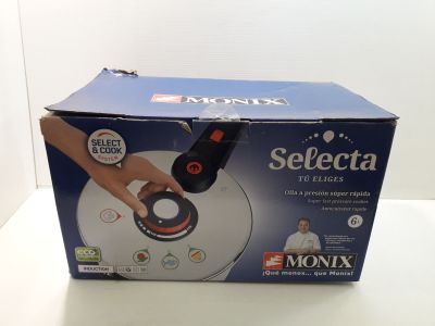 a box that has a remote in it on a table