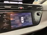 a picture of a car dashboard with a cell phone in it