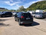 a lot of cars that are parked in a parking lot