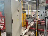 a picture of a machine in a factory with a lot of equipment