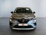 the front view of a grey car in a showroom
