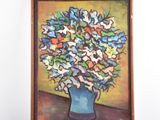 tableau représentant un vase de fleurs posé sur une table devant un mur blanc