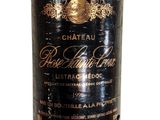 a bottle of wine that is sitting on a table