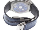 a watch with a blue dial on a black leather strap
