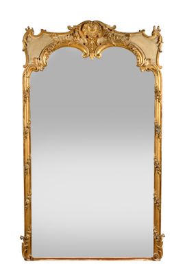 an ornate gold mirror with a white background and a white background